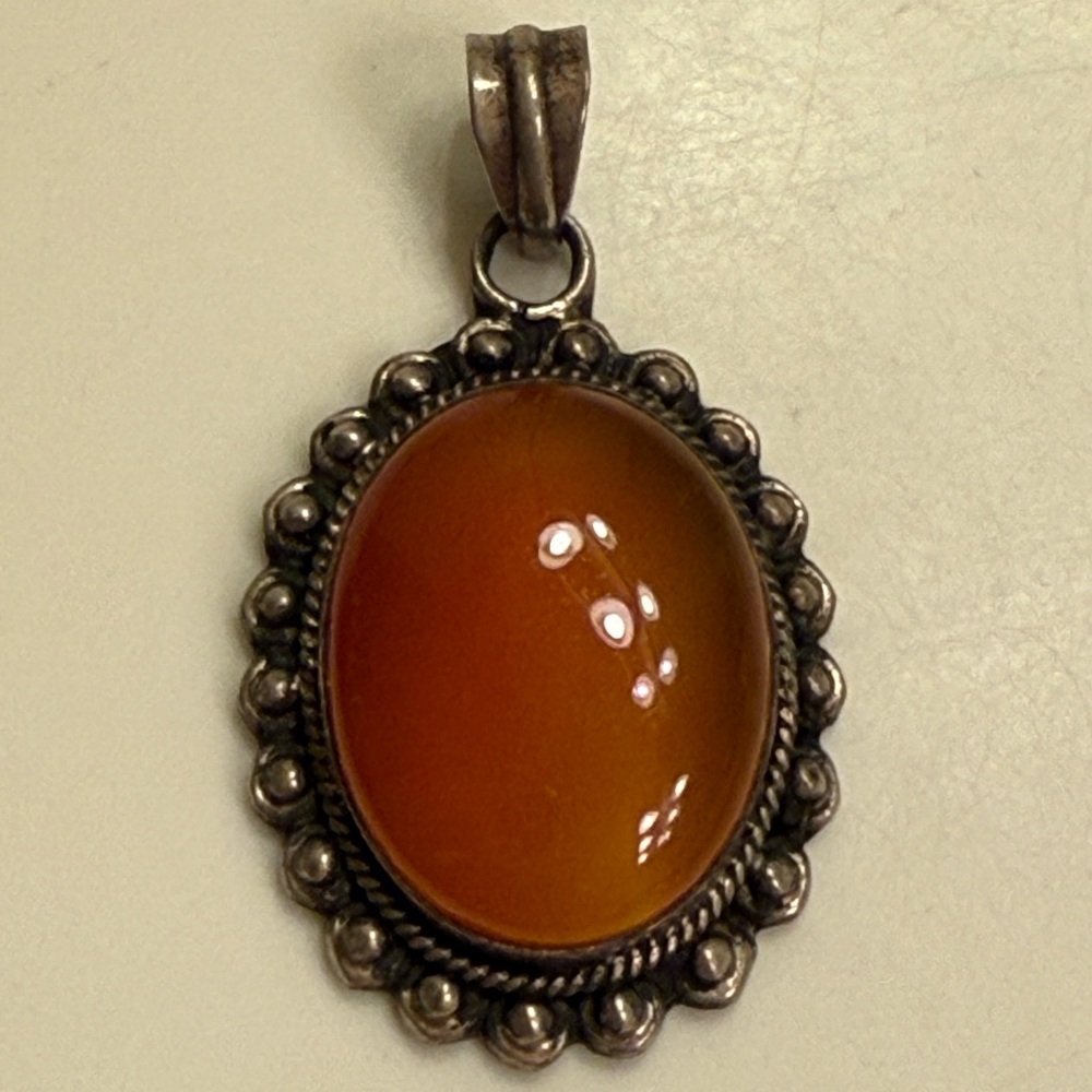 Large vintage sterling silver CRnelian pendant